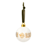 White ceramic bauble decoration with golden patterns from the First Folio and Shakespeare's initials, hung from a green velvet ribbon.