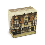 Cubical card clotted cream fudge box featuring an old coloured drawing of Shakespeare's Birthplace, with a dog in the foreground. 