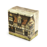 Clotted cream fudge box featuring an old coloured drawing of Shakespeare's Birthplace, with a dog in the foreground. 