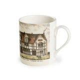 Souvenir white china mug featuring an old coloured drawing of Shakespeare's Birthplace, with a dog in the foreground. Under the drawing the handwritten text says 'The House in Stratford upon Avon, in which Shakespeare was born'.